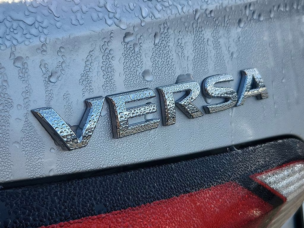 2025 Brilliant Silver Metallic Nissan Versa 1.6 S FWD Sedan