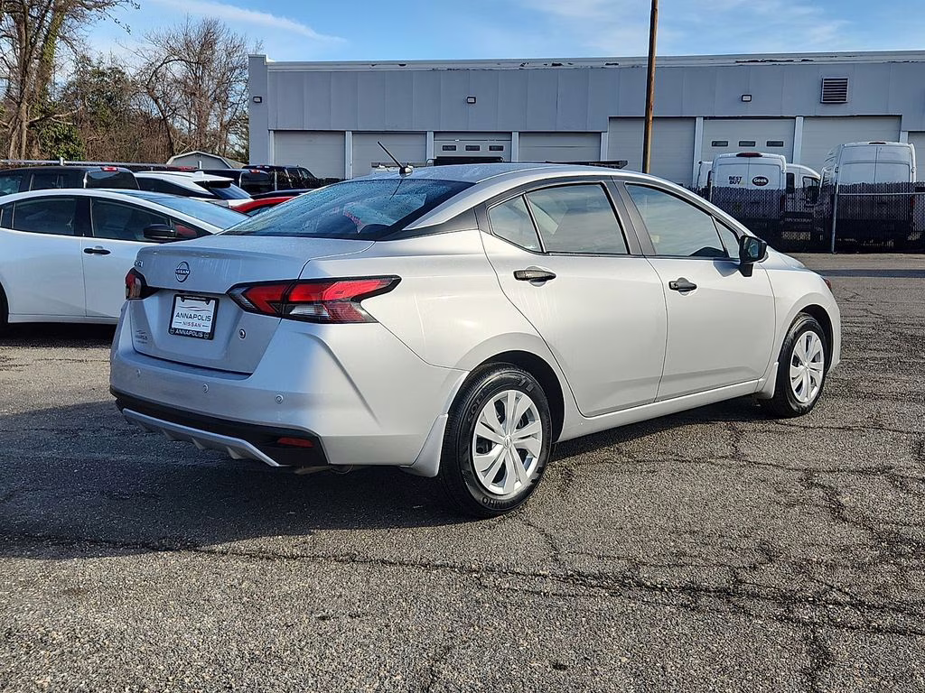 2025 Brilliant Silver Metallic Nissan Versa 1.6 S FWD Sedan