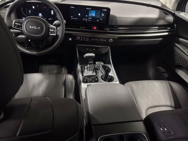 2026 Astra Blue Kia Carnival SX FWD Van