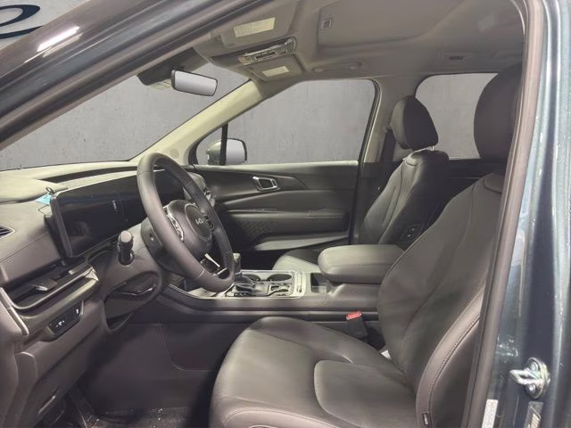 2026 Astra Blue Kia Carnival SX FWD Van