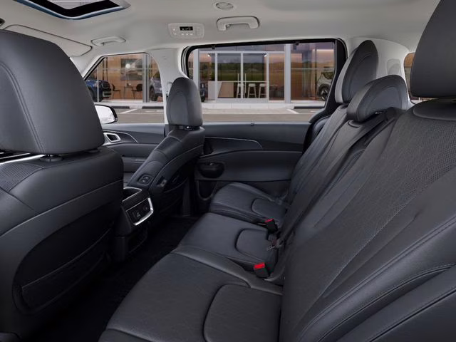 2026 Astra Blue Kia Carnival SX FWD Van