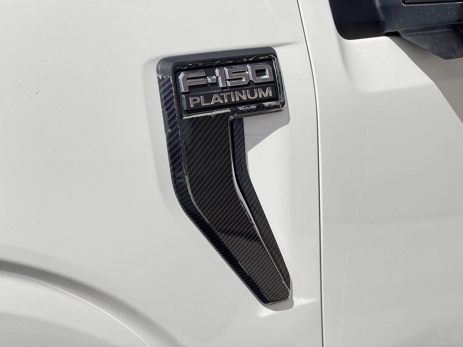 2021 Star White Metallic Tri-Coat Ford F-150 Platinum 4X4 Truck