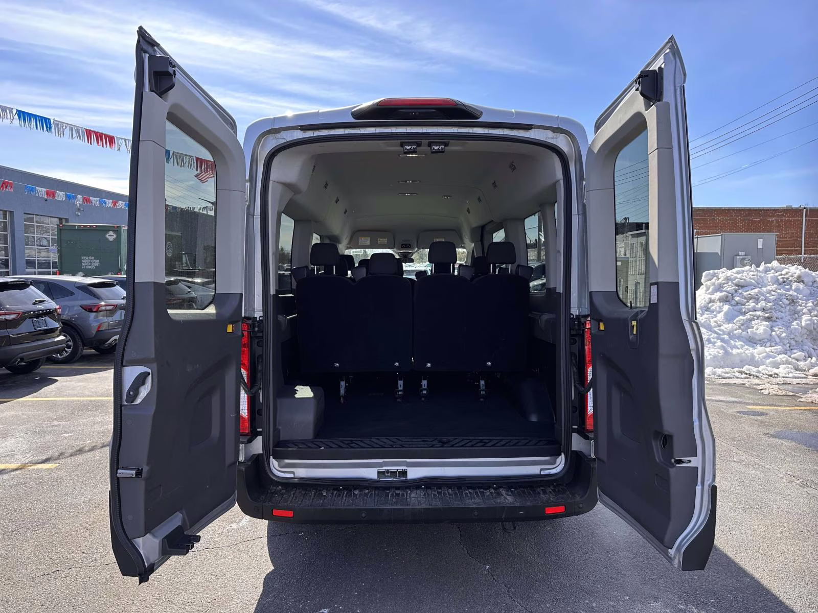 2023 Ingot Silver Ford Transit Passenger Wagon T-350 148 Med Roof XLT RWD RWD Van