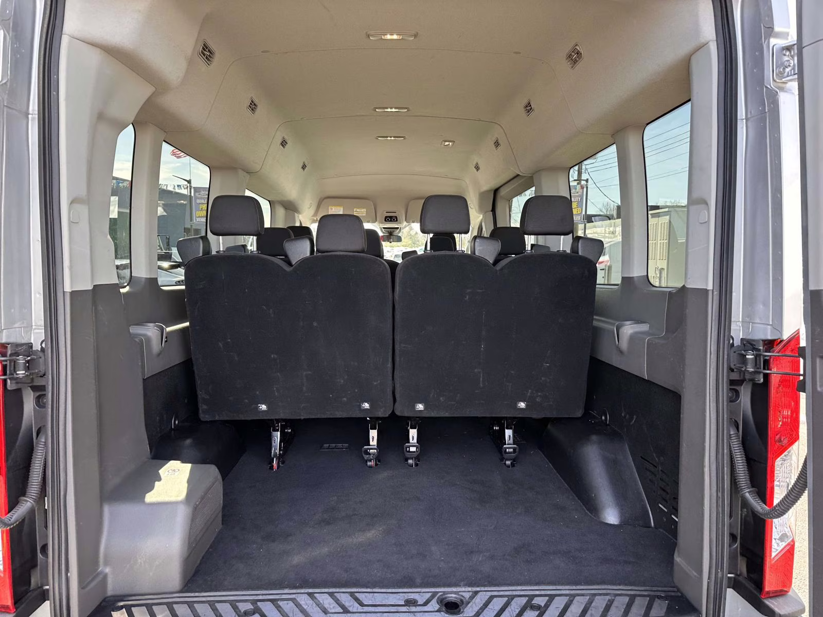 2023 Ingot Silver Ford Transit Passenger Wagon T-350 148 Med Roof XLT RWD RWD Van