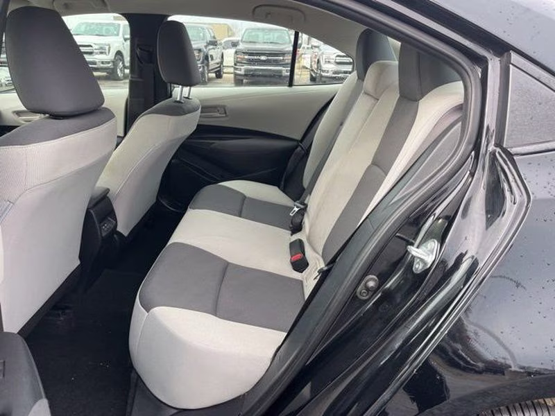 2024 Midnight Black Metallic Toyota Corolla LE FWD Sedan