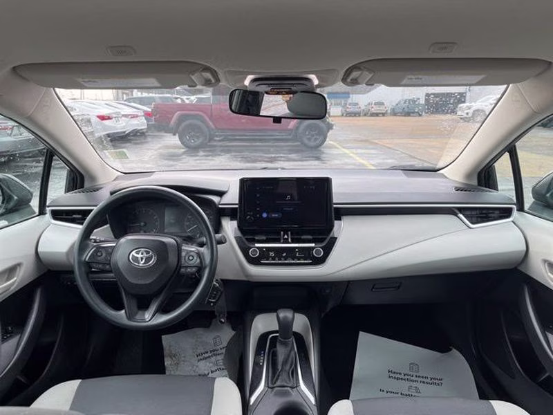 2024 Midnight Black Metallic Toyota Corolla LE FWD Sedan