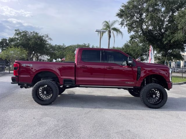 2026 Ruby Red Metallic Tinted Clearcoat Ford Super Duty F-250 SRW Platinum Lift 4X4 Truck