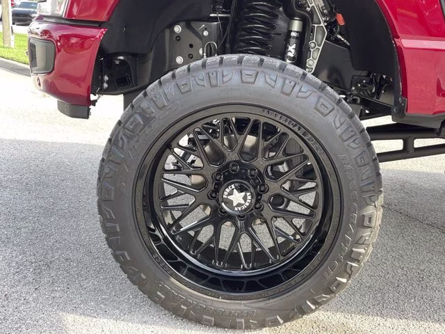 2026 Ruby Red Metallic Tinted Clearcoat Ford Super Duty F-250 SRW Platinum Lift 4X4 Truck