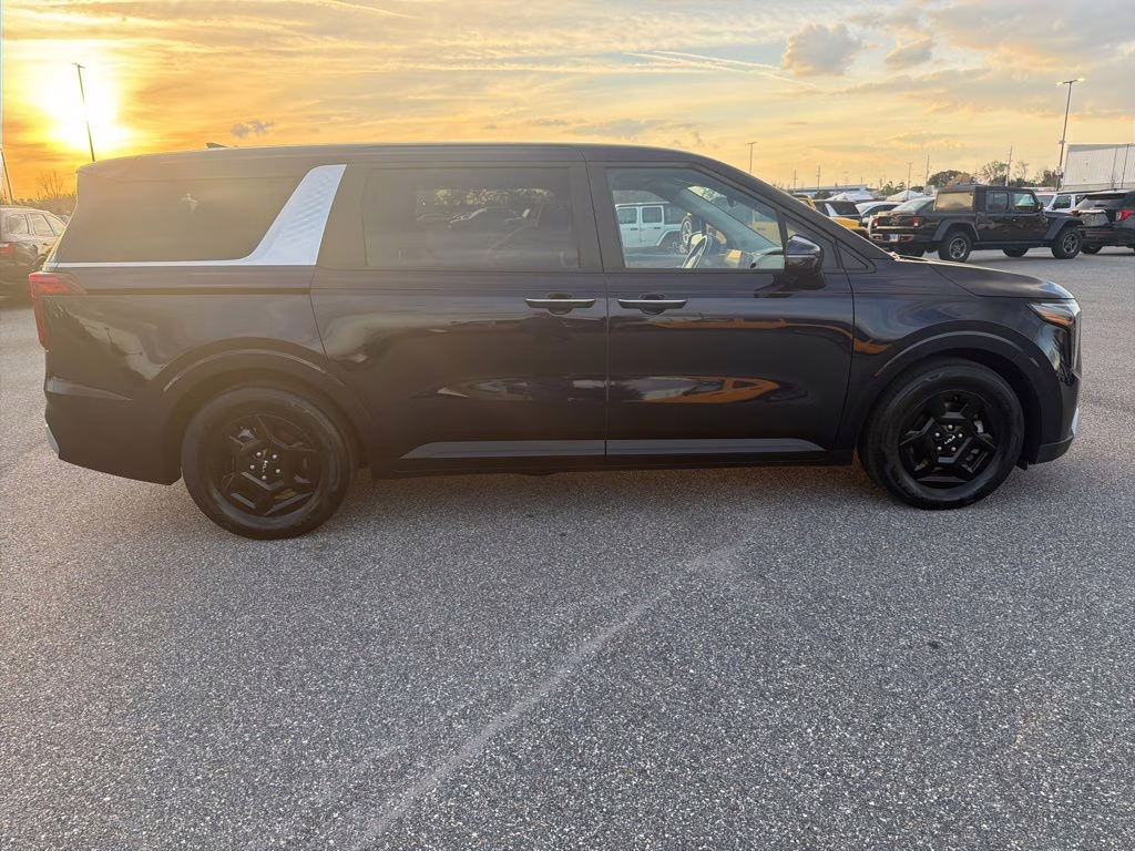 2025 Deep Chroma Blue Kia Carnival LXS FWD Van