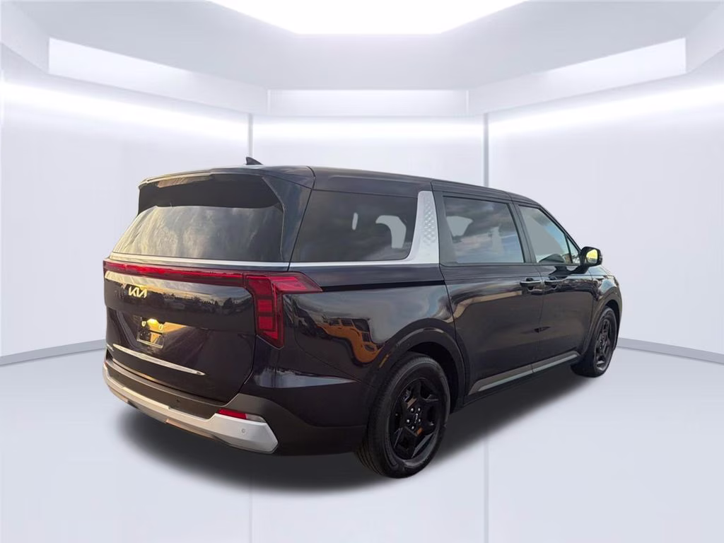2025 Deep Chroma Blue Kia Carnival LXS FWD Van
