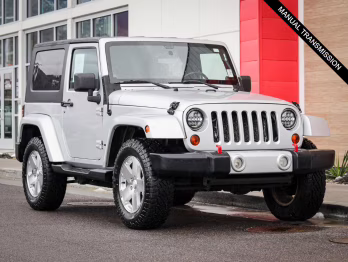 2010 Bright Silver Metallic Jeep Wrangler Sahara 4X4 2 Door