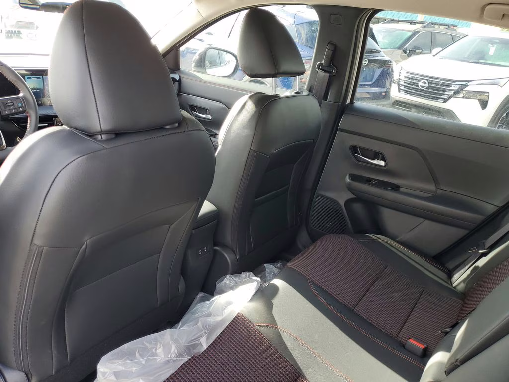 2026 Aspen White/Super Black Nissan Kicks SR FWD SUV
