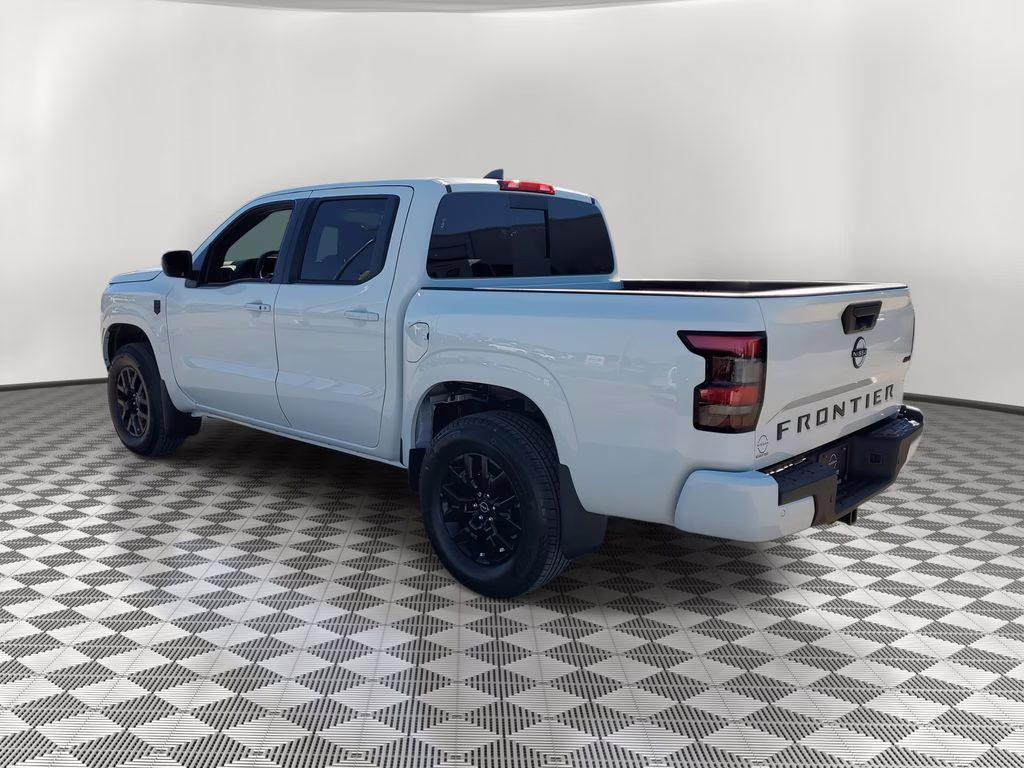 2026 Glacier White Nissan Frontier SV 4X4 Truck