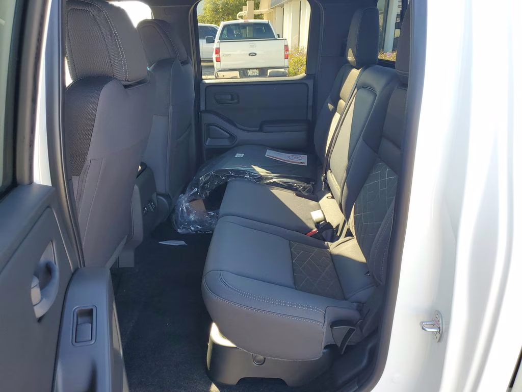 2026 Glacier White Nissan Frontier SV 4X4 Truck