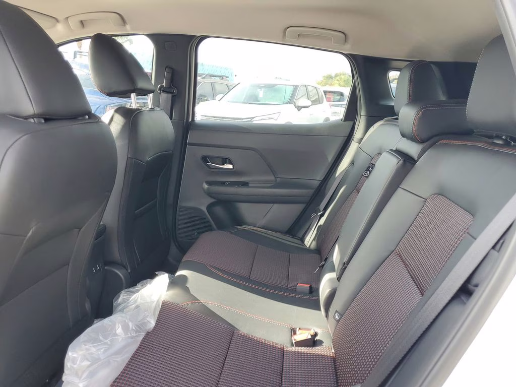 2026 Aspen White/Super Black Nissan Kicks SR FWD SUV