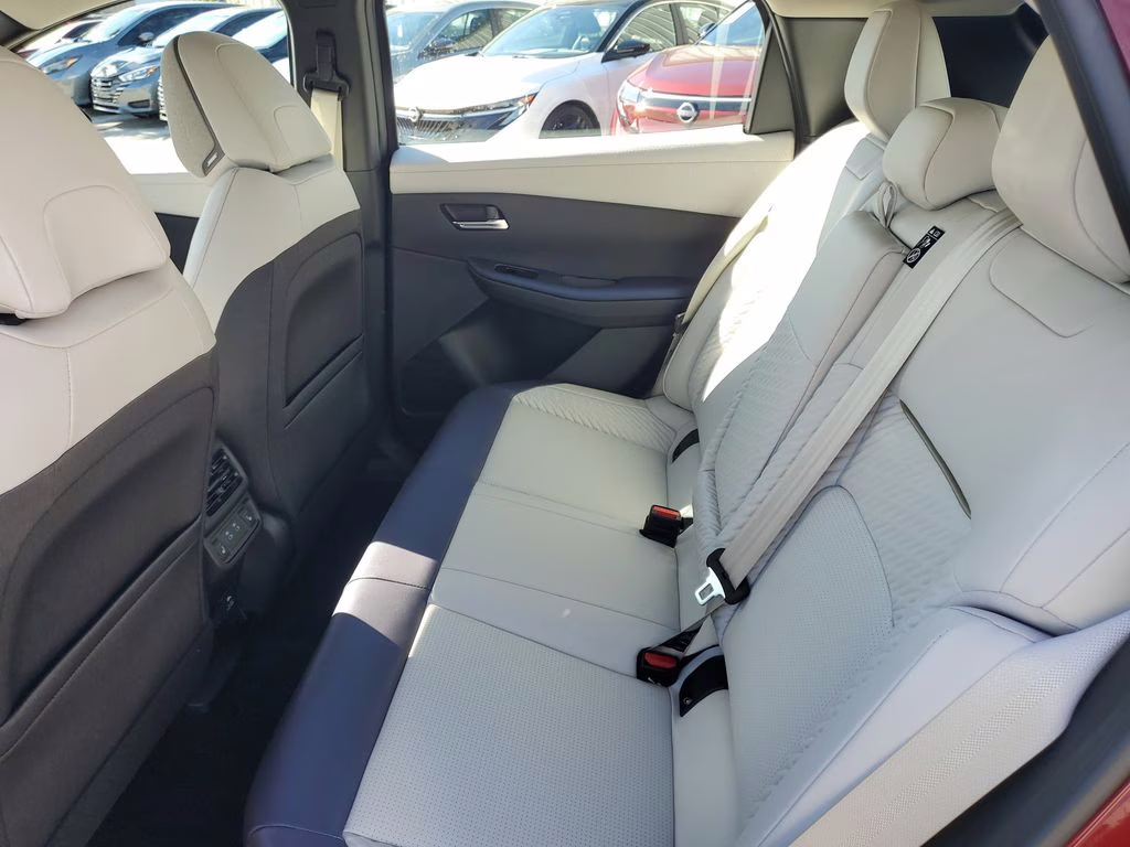 2026 Coulis Red Metallic/Black Nissan LEAF PLATINUM+ FWD SUV