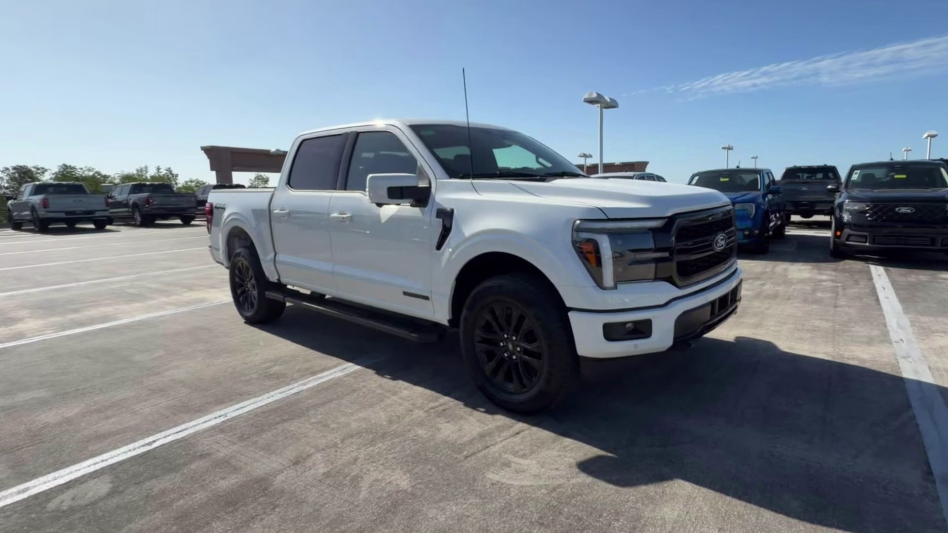 2026 Star White Metallic Tri-Coat Ford F-150 LARIAT Crew Cab Pickup 4X4 Truck