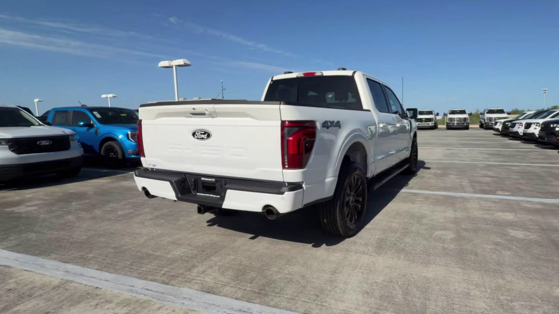 2026 Star White Metallic Tri-Coat Ford F-150 LARIAT Crew Cab Pickup 4X4 Truck