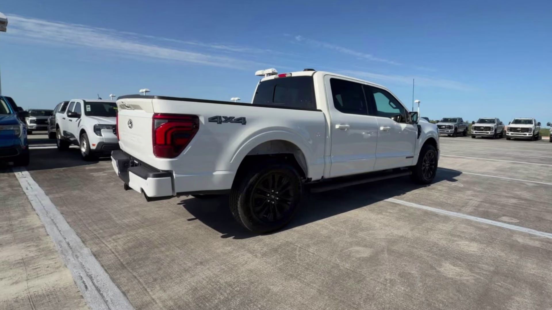 2026 Star White Metallic Tri-Coat Ford F-150 LARIAT Crew Cab Pickup 4X4 Truck