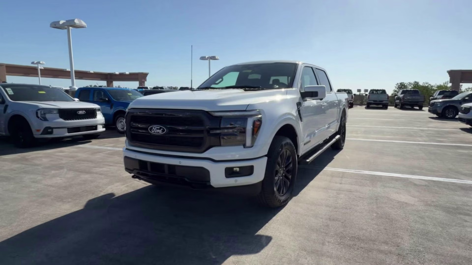 2026 Star White Metallic Tri-Coat Ford F-150 LARIAT Crew Cab Pickup 4X4 Truck