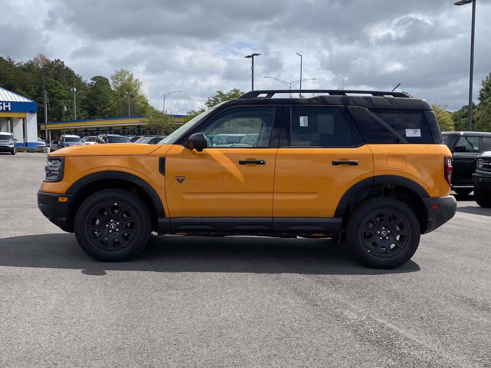 2026 Orange Fury Metallic Tri-Coat Ford Bronco Sport Badlands 4X4 SUV