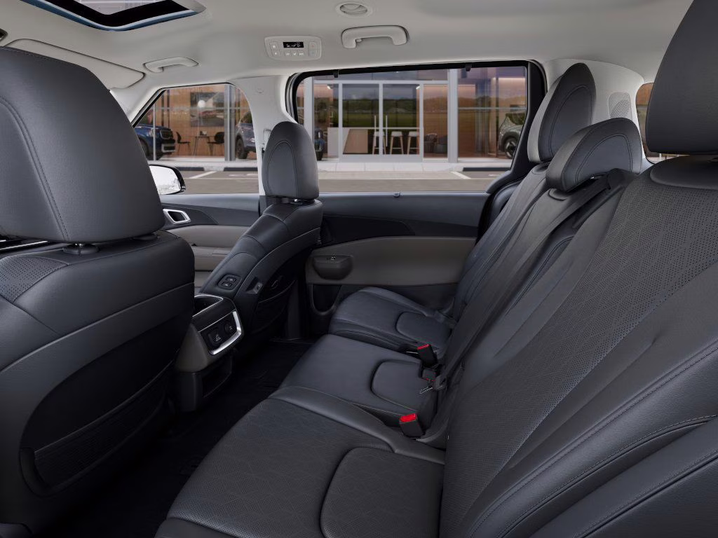 2026 Astra Blue Kia Carnival Hybrid SX FWD Van