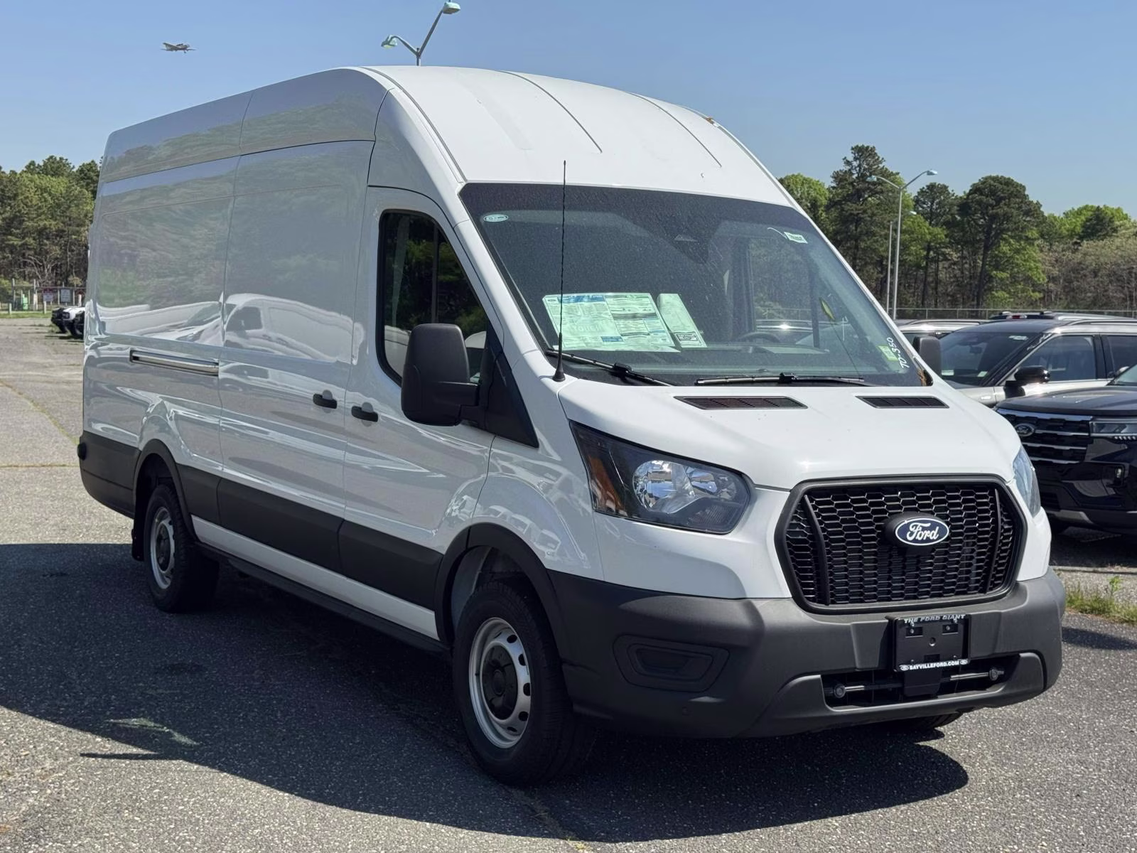 2026 Oxford White Ford Transit Cargo Van T-250 148 EL Hi Rf 9150 GVWR RWD RWD Van