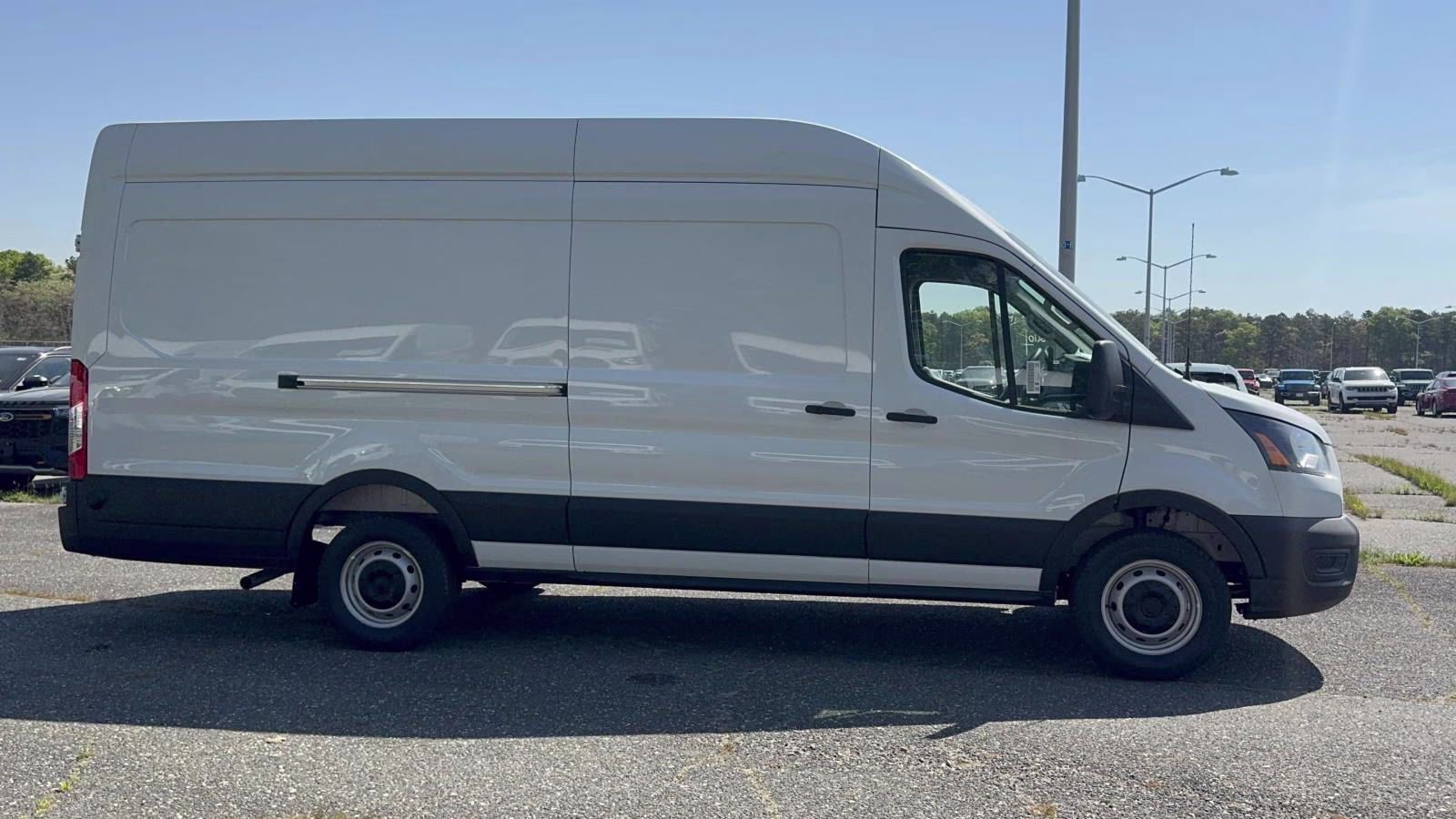 2026 Oxford White Ford Transit Cargo Van T-250 148 EL Hi Rf 9150 GVWR RWD RWD Van