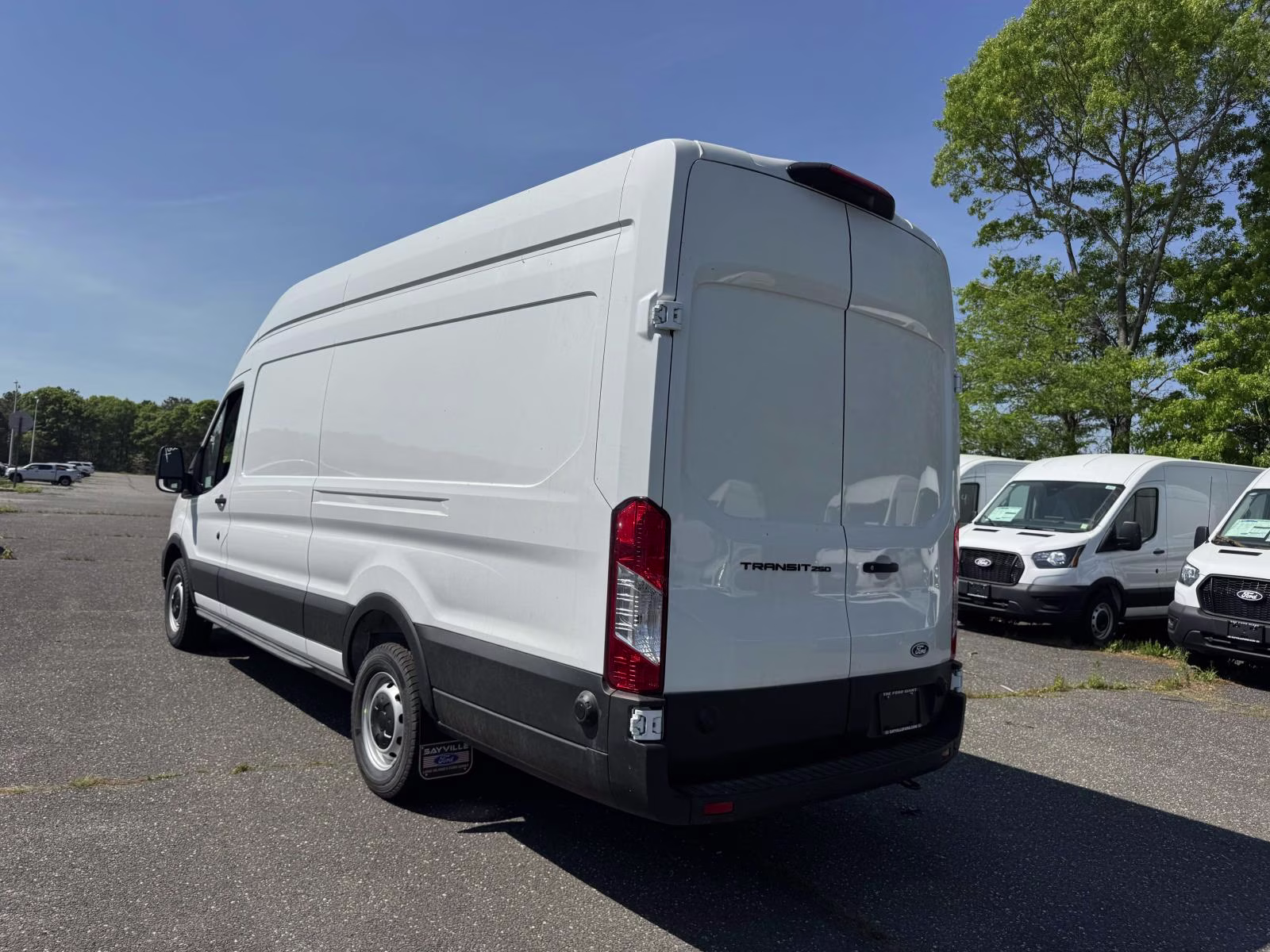 2026 Oxford White Ford Transit Cargo Van T-250 148 EL Hi Rf 9150 GVWR RWD RWD Van
