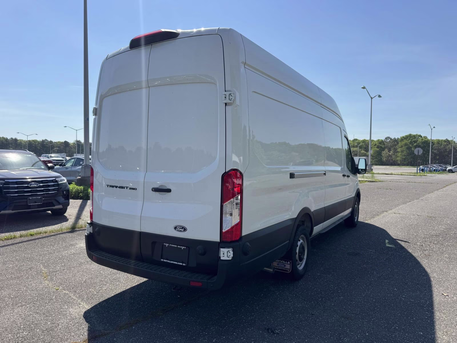 2026 Oxford White Ford Transit Cargo Van T-250 148 EL Hi Rf 9150 GVWR RWD RWD Van