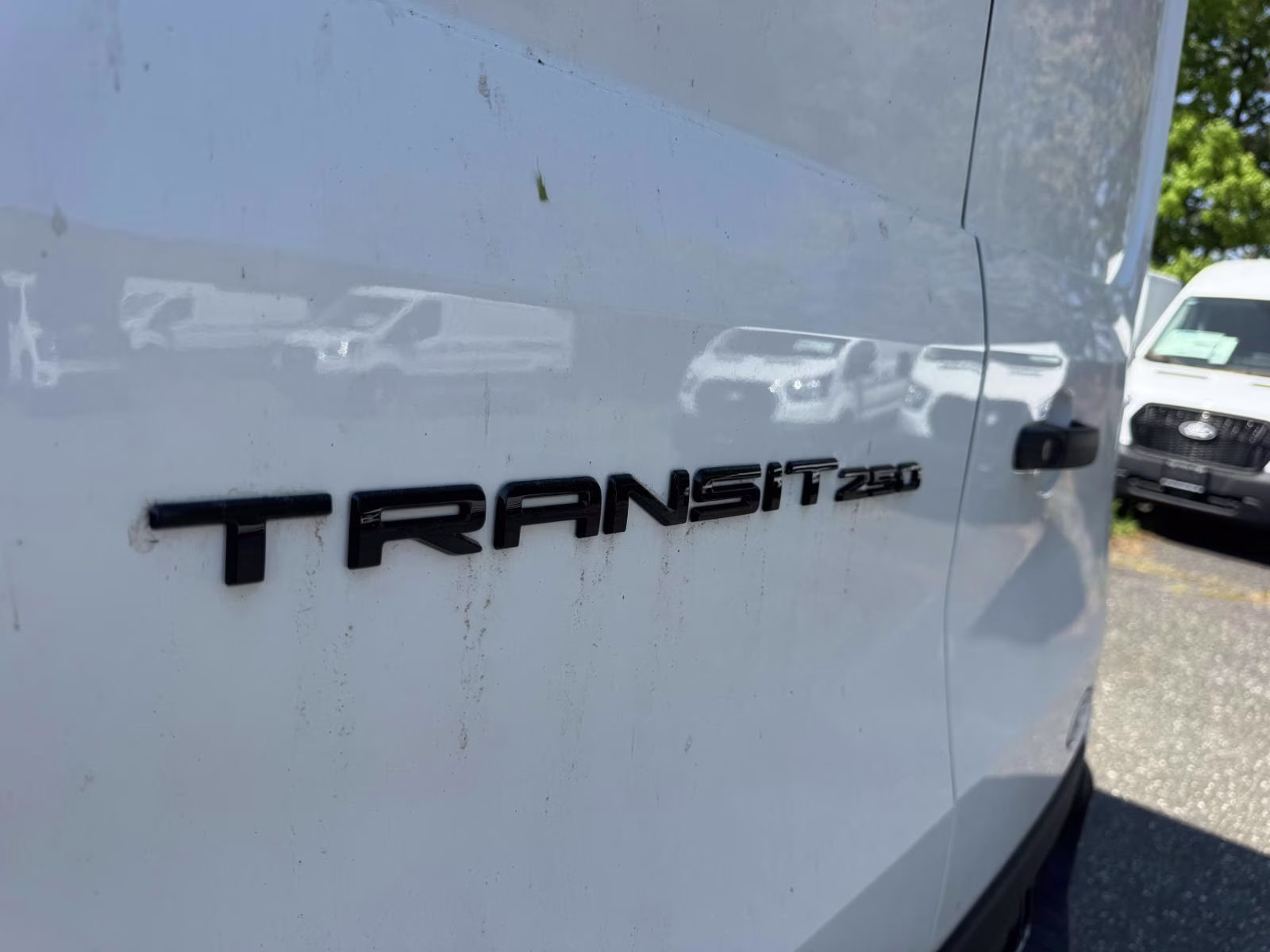 2026 Oxford White Ford Transit Cargo Van T-250 148 EL Hi Rf 9150 GVWR RWD RWD Van