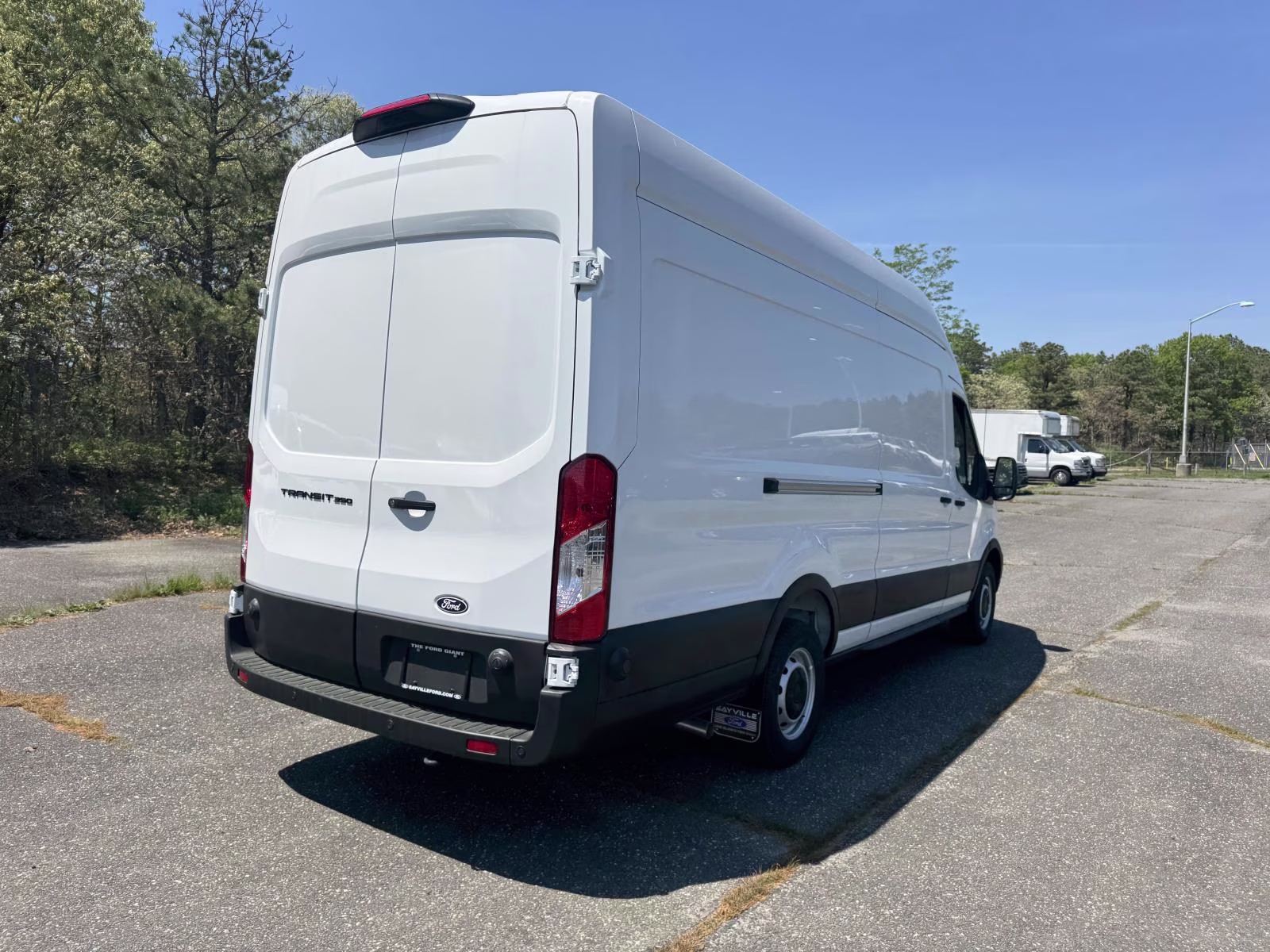 2026 Oxford White Ford Transit Cargo Van T-350 148 EL Hi Rf 9500 GVWR RWD RWD Van