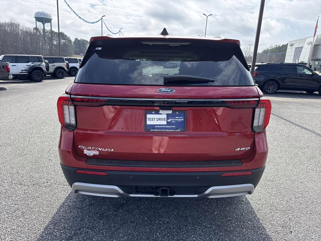 2025 Rapid Red Metallic Tinted Clearcoat Ford Explorer Platinum 4X4 SUV