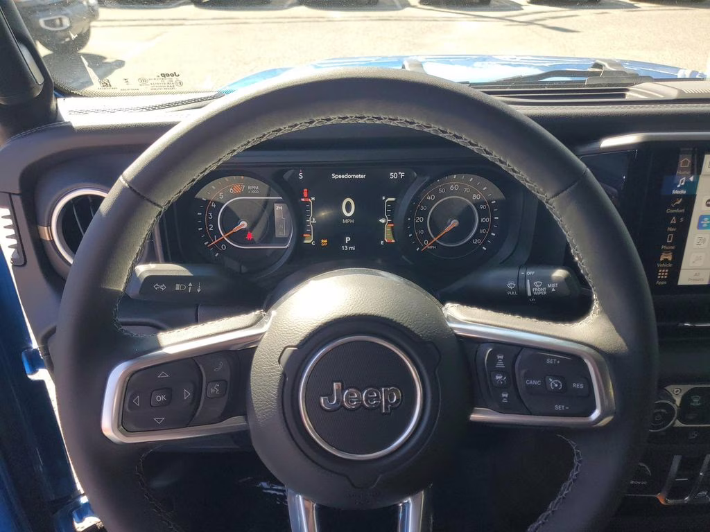 2025 Hydro Blue Pearl Coat Jeep Wrangler Sahara 4X4 SUV