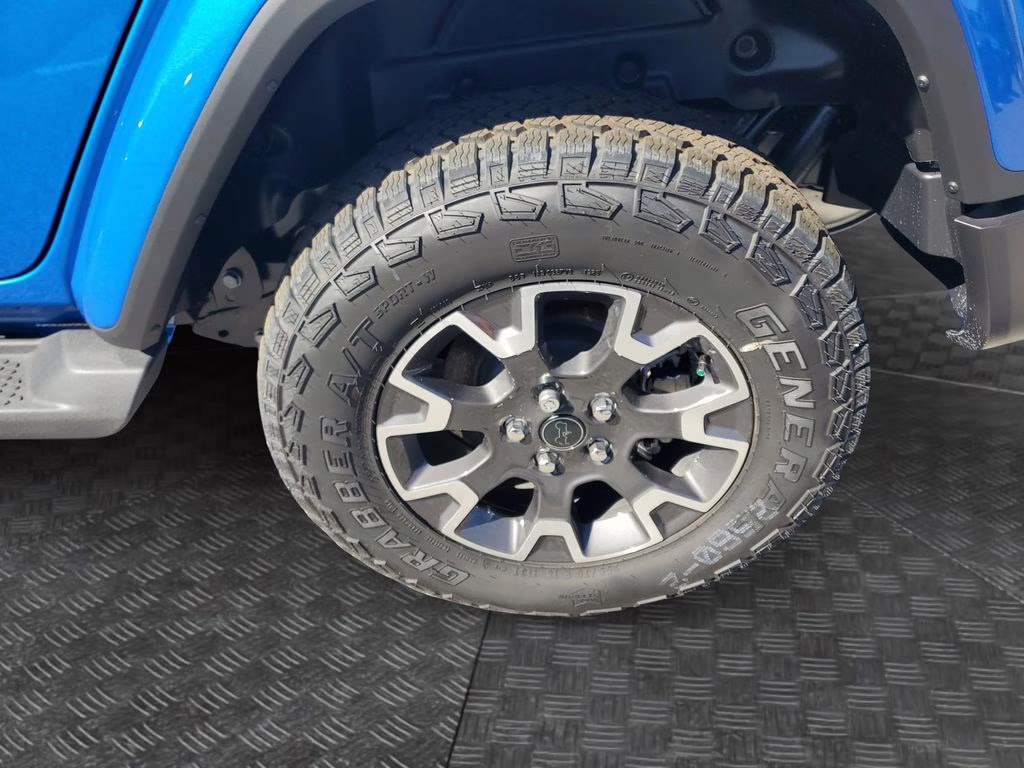 2025 Hydro Blue Pearl Coat Jeep Wrangler Sahara 4X4 SUV