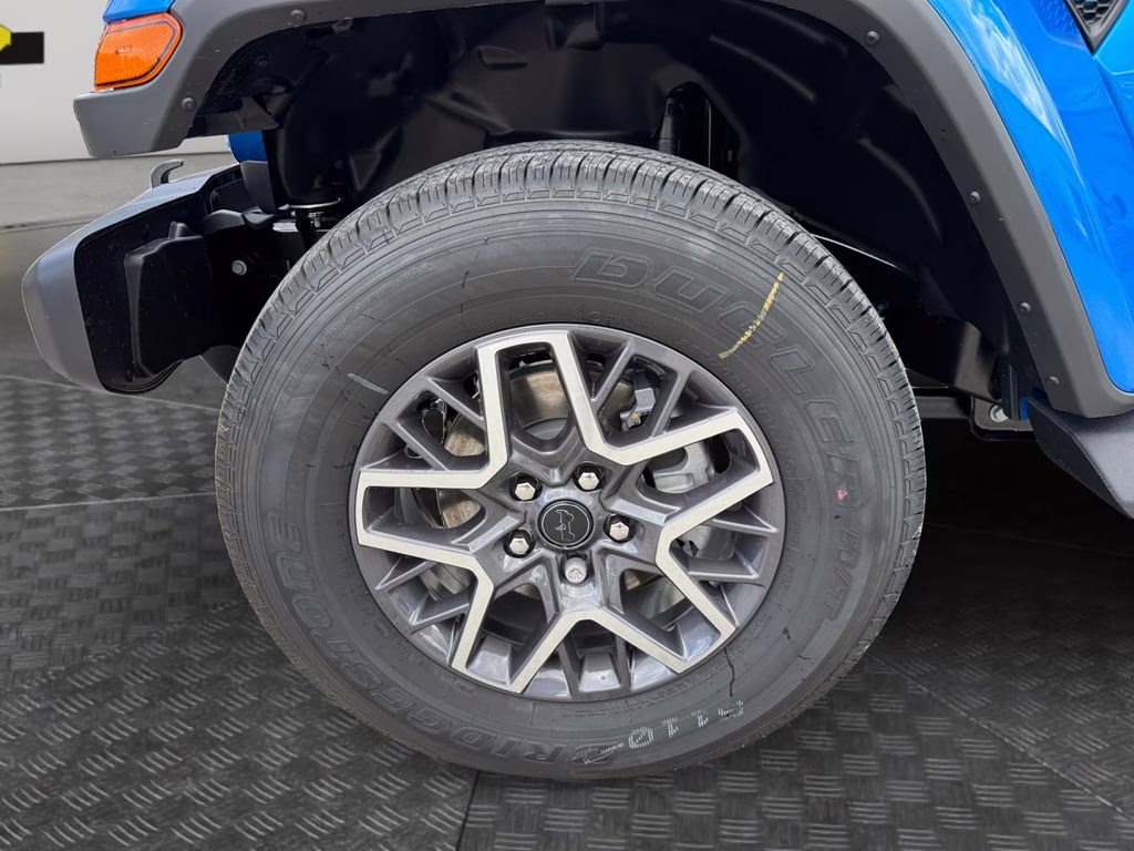 2025 Hydro Blue Pearl Coat Jeep Wrangler Sahara 4X4 SUV