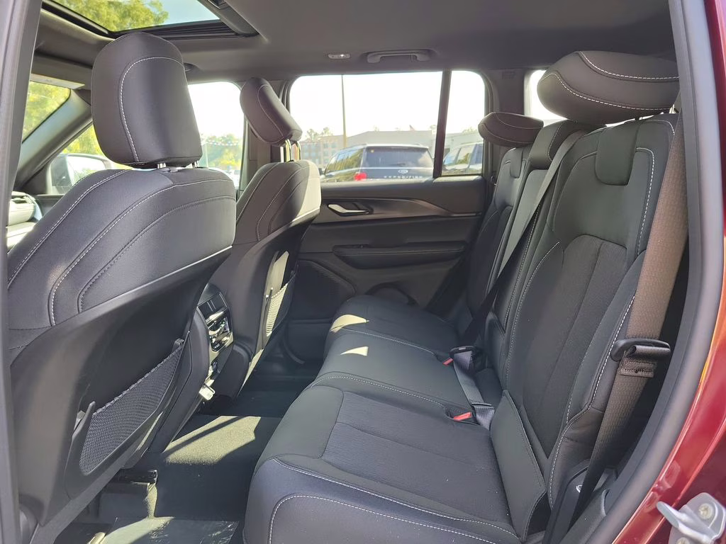 2025 Velvet Red Pearlcoat Jeep Grand Cherokee Laredo X RWD SUV