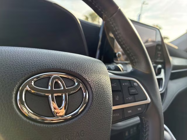 2024 Midnight Black Metallic Toyota Highlander LE AWD SUV