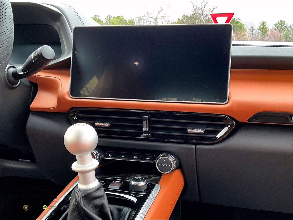 2026 Vivid Red Lotus Emira V6 SE RWD Coupe