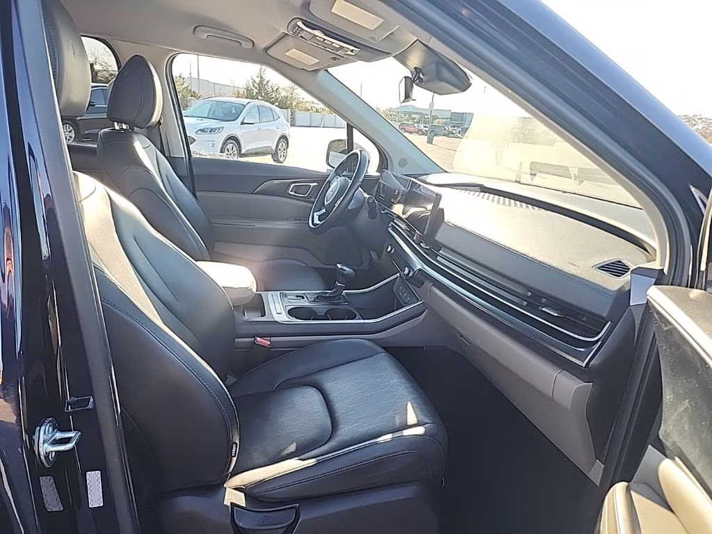 2025 Deep Chroma Blue Kia Carnival LXS FWD Van