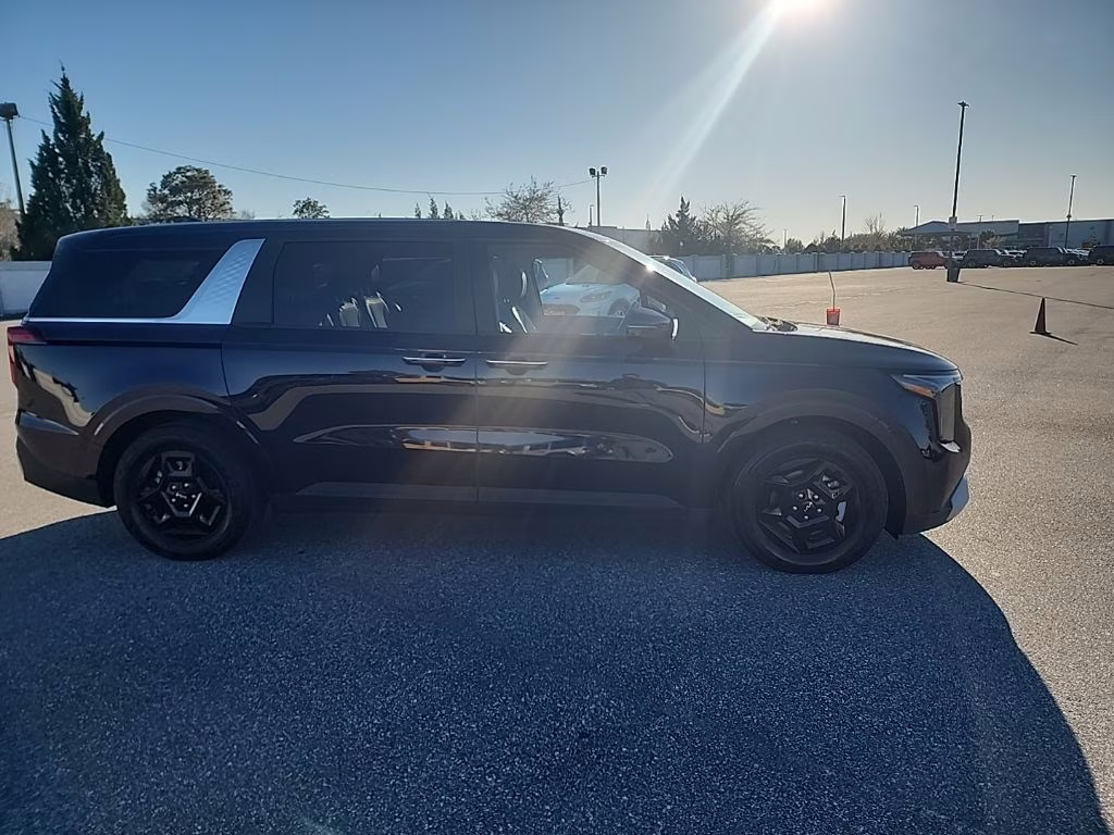 2025 Deep Chroma Blue Kia Carnival LXS FWD Van