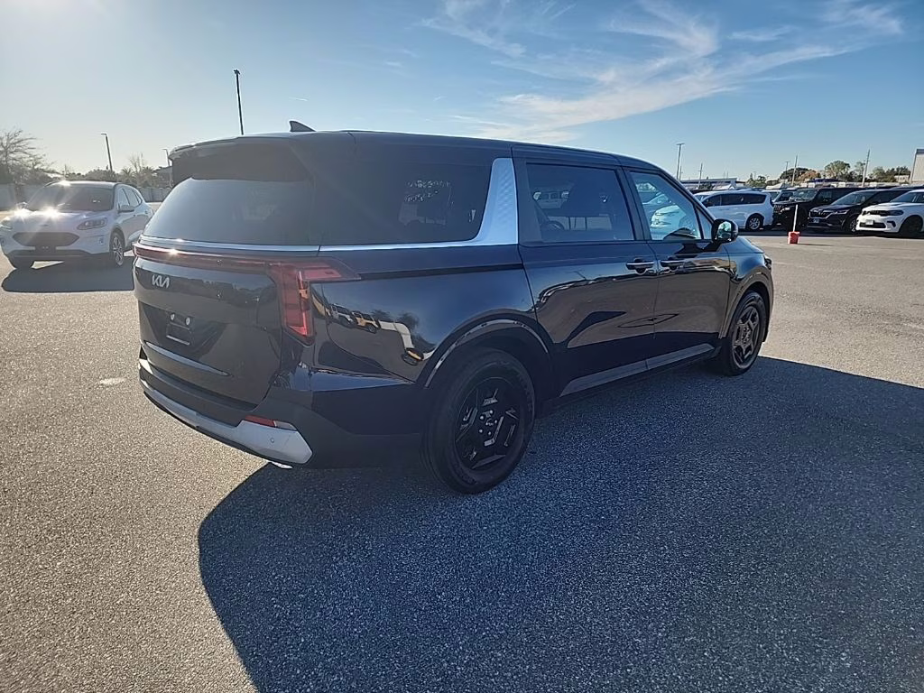 2025 Deep Chroma Blue Kia Carnival LXS FWD Van