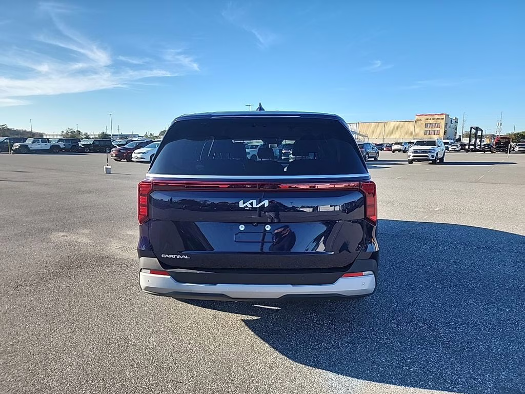2025 Deep Chroma Blue Kia Carnival LXS FWD Van