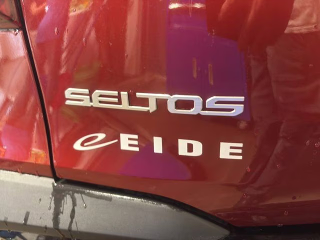 2026 Mars Orange Kia Seltos S AWD SUV
