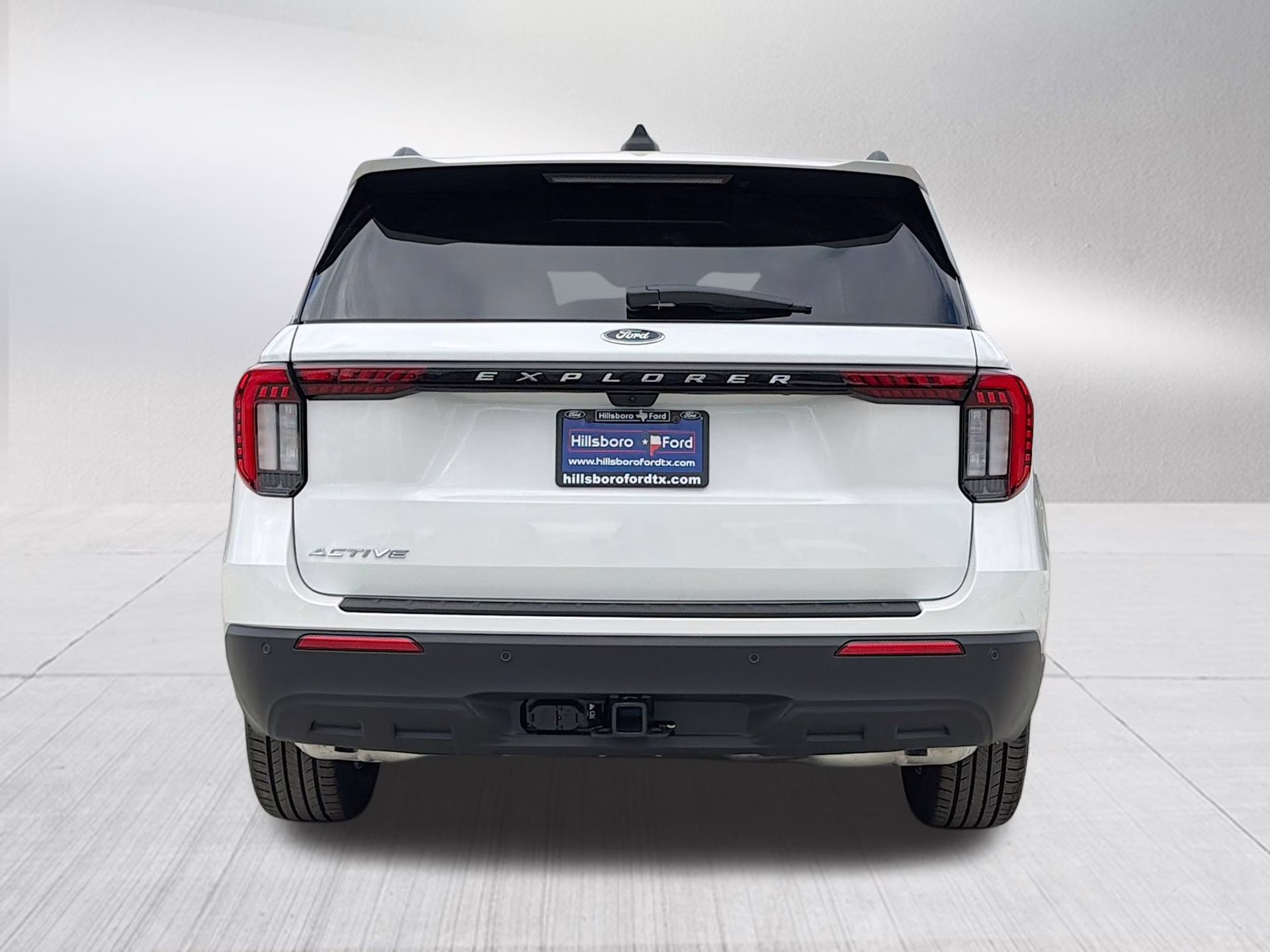 2026 Star White Metallic Tri-Coat Ford Explorer Active RWD SUV