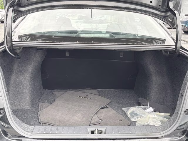 2025 Super Black Metallic Nissan Versa 1.6 S FWD Sedan
