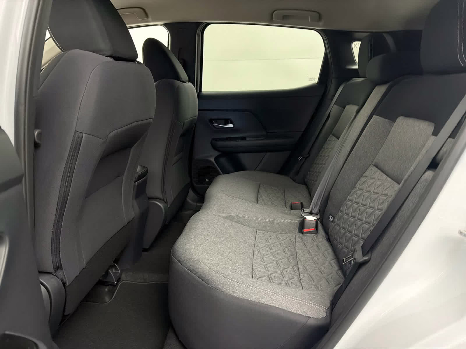 2026 Aspen White Tricoat/Super Black Nissan Kicks SV FWD SUV