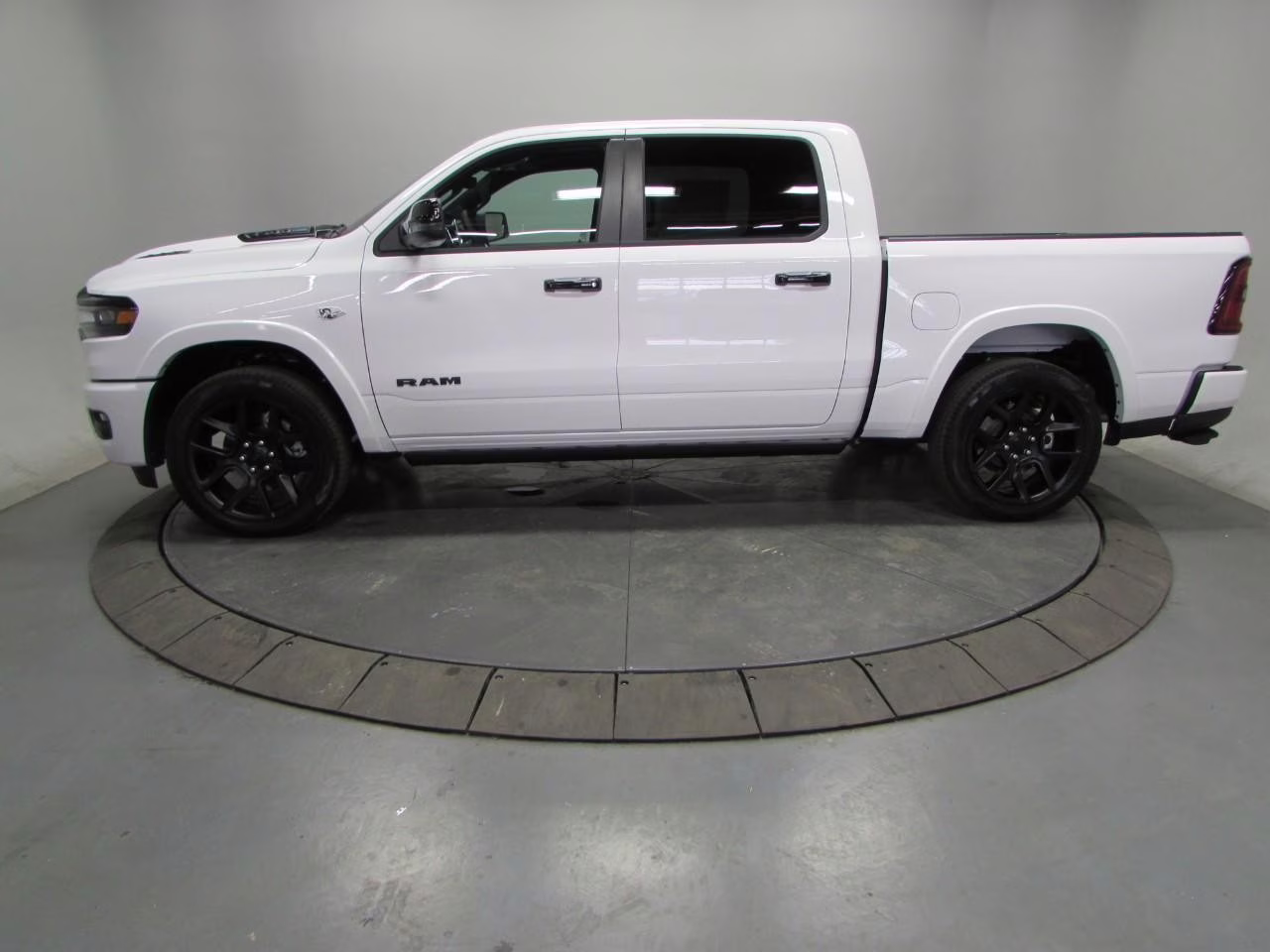 2026 Bright White Clearcoat Ram 1500 Laramie 4X4 Truck