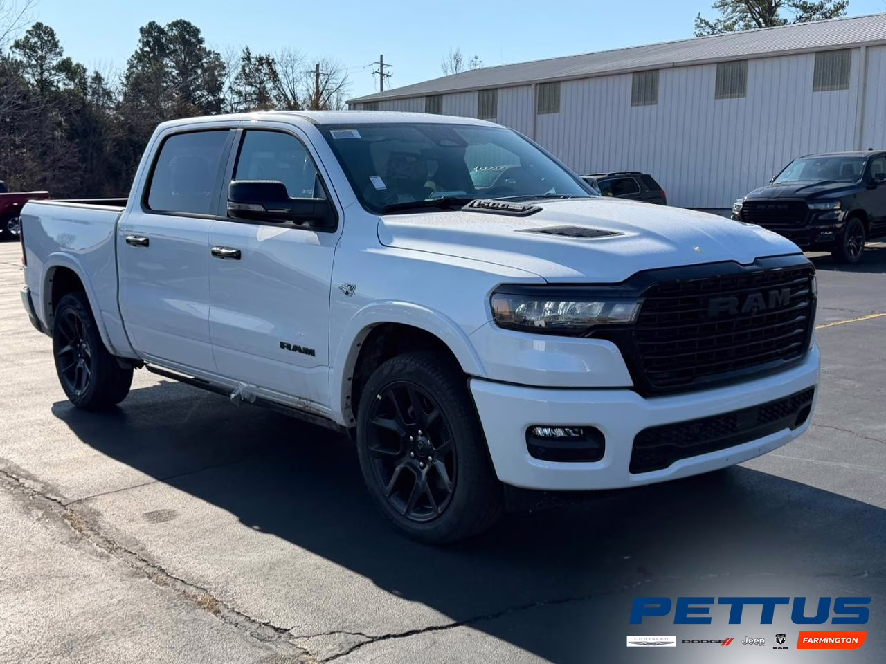 2026 Ivory White Tri-Coat Pearlcoat Ram 1500 Laramie 4X4 Truck