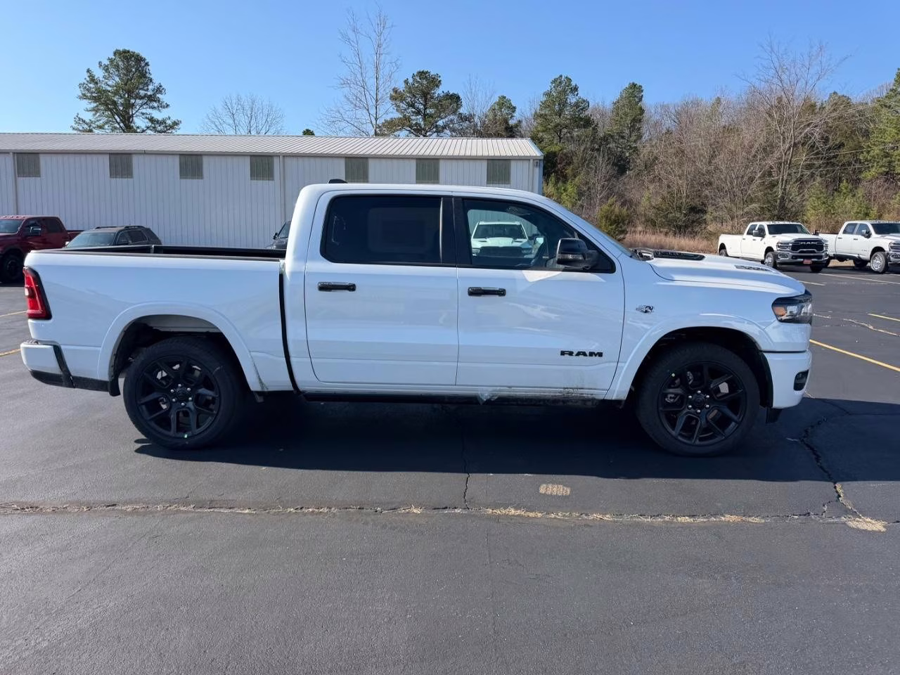 2026 Ivory White Tri-Coat Pearlcoat Ram 1500 Laramie 4X4 Truck